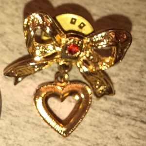 Goldtone Heart And Bow Lapel Pin